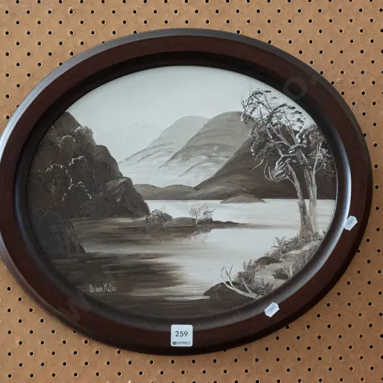 oval framed oil - lake & mountain scene