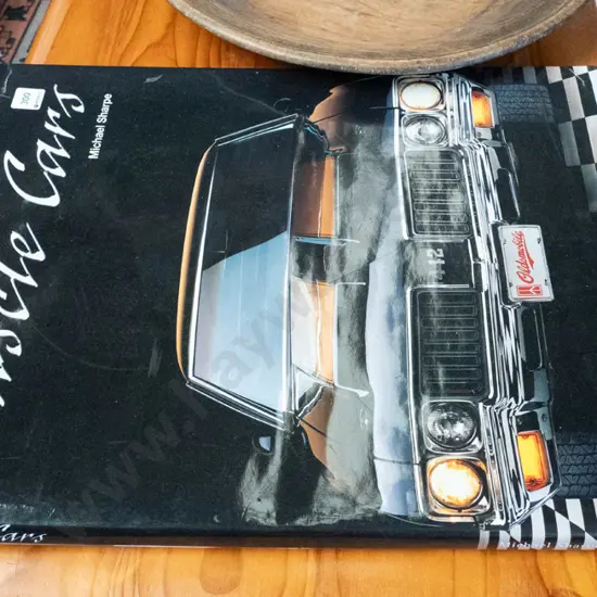 large hard-cover coffee table book - Muscle Cars
