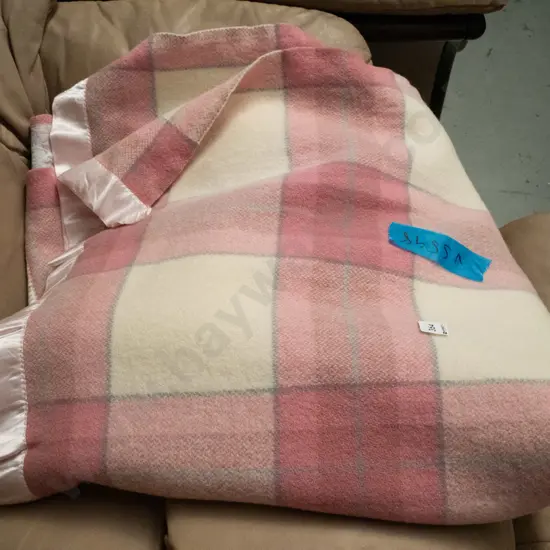 cream and pink checked woollen blanket