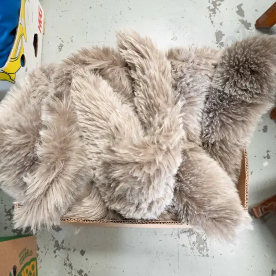 box; faux fur sheepskins