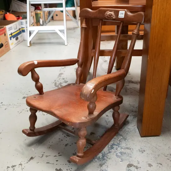 small mahogany child's or doll's rocking chair