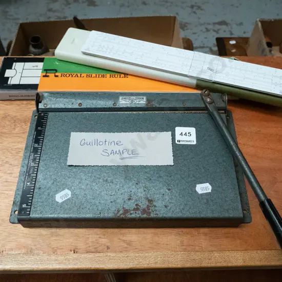small guillotine, slide rule