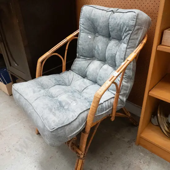cane deep buttoned armchair