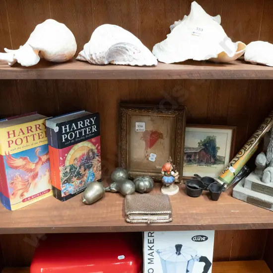 shelf; Harry Potter books, sacred heart needlework, miniatures, etc.