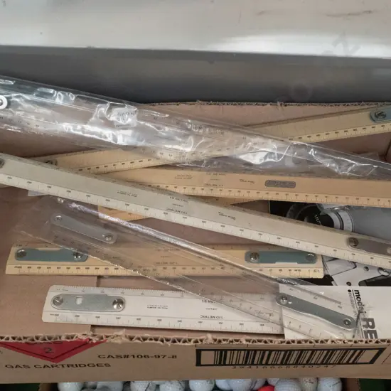 box of draughting rulers