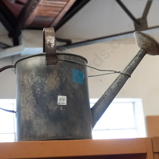 galvanised watering can
