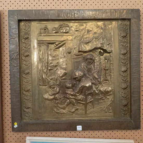 beaten brass centre to a fire screen