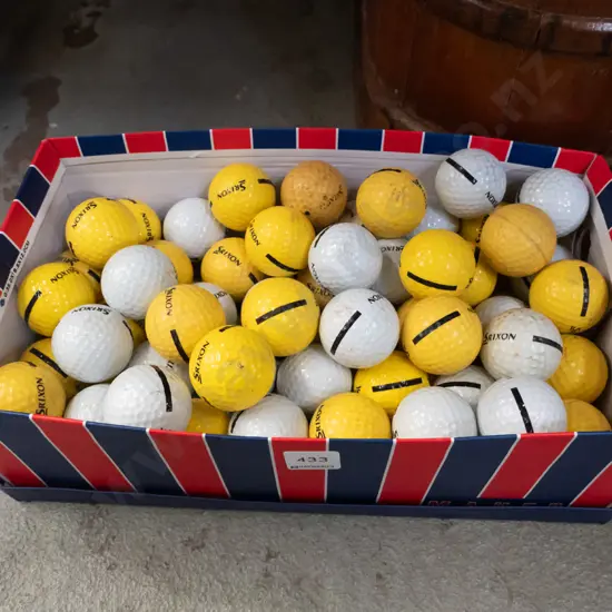 shoe box, driving range golf balls