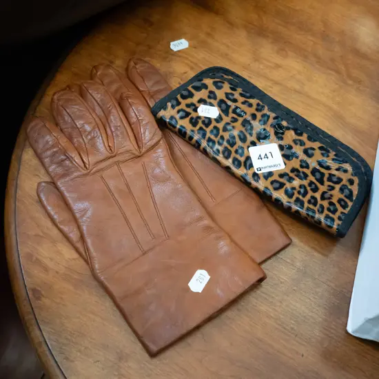 leather gloves and glasses case