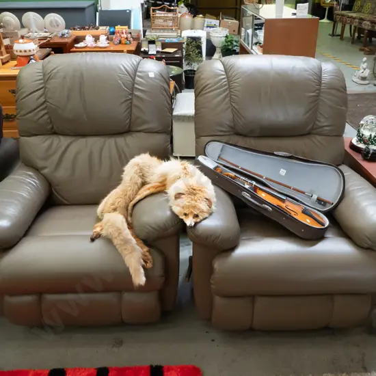 pair of leather La-Z-Boy rocker/recliners