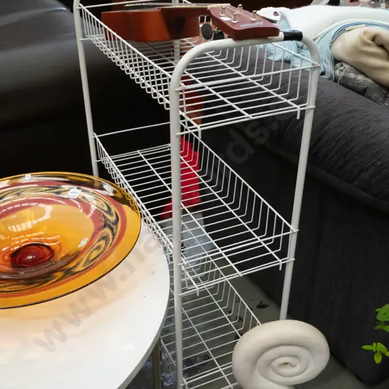 3 tier metal storage rack on casters