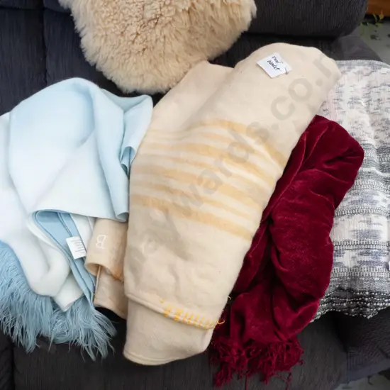 bundle of wool and other blankets