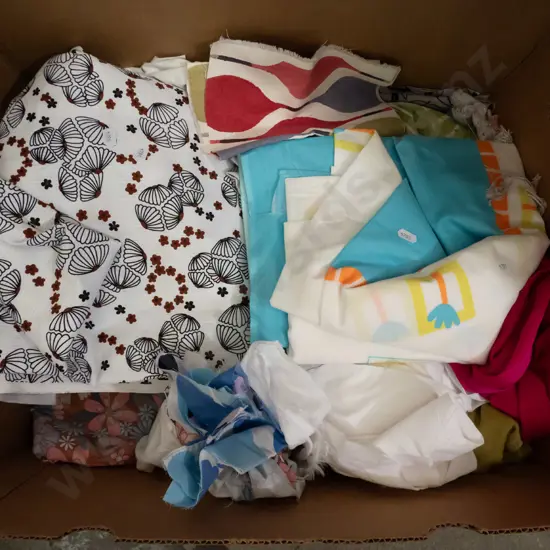 box of fabric pieces