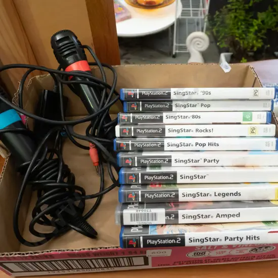 Sing Star Play Station games & microphones