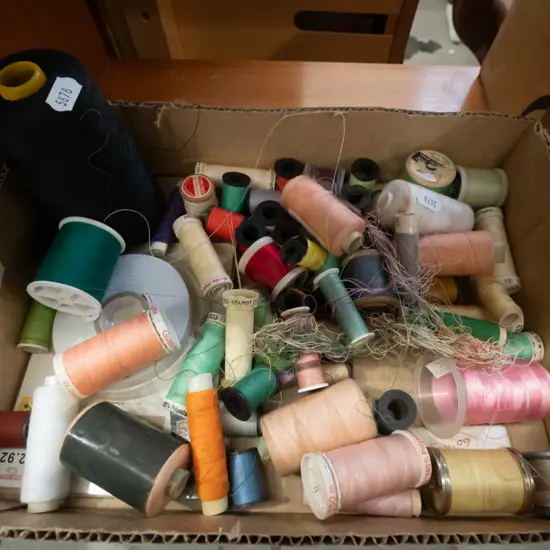 box of sewing thread