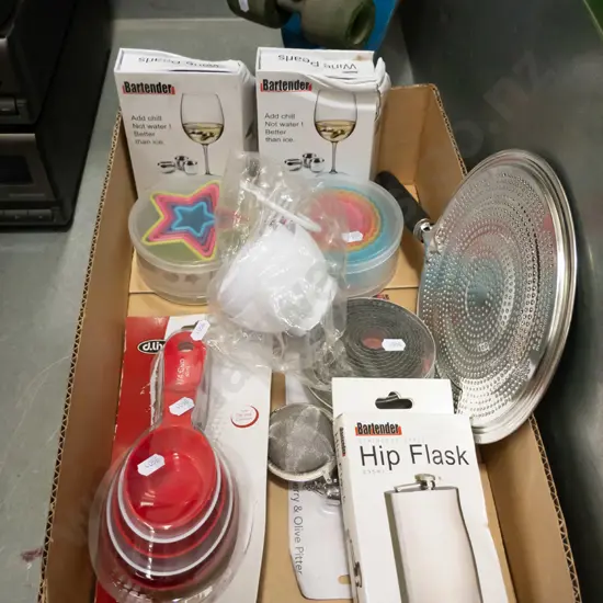 box; cookie cutters, measuring cups, hip flask etc