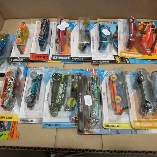 box of carded Hot Wheels cars