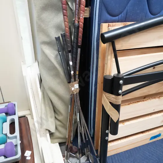 bundle of vintage golf clubs