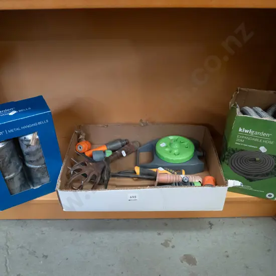 shelf; garden tools, retractable hose etc