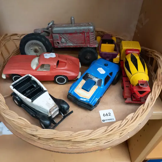 round cane tray, various toys