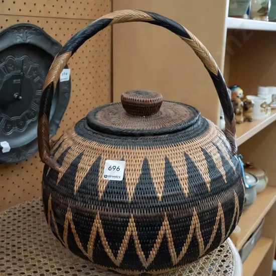 lidded cane basket