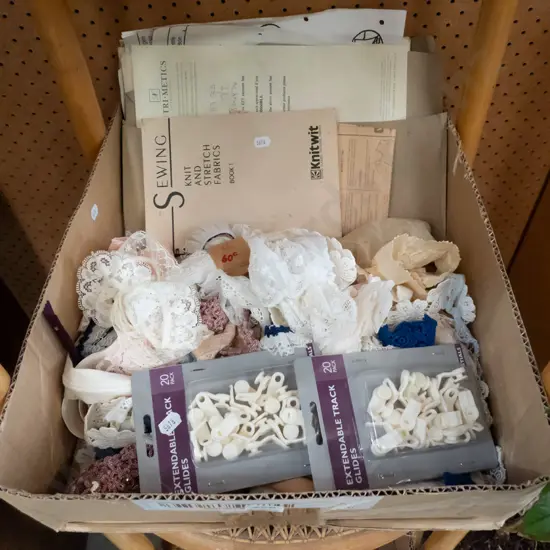 box; ribbons, fabric books etc