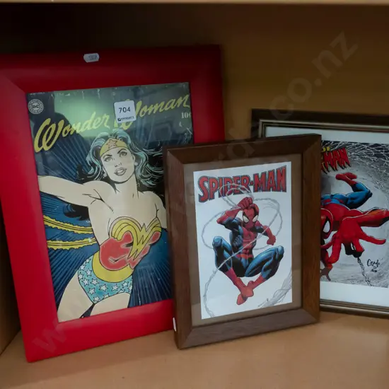 framed Wonder Woman and Spiderman prints