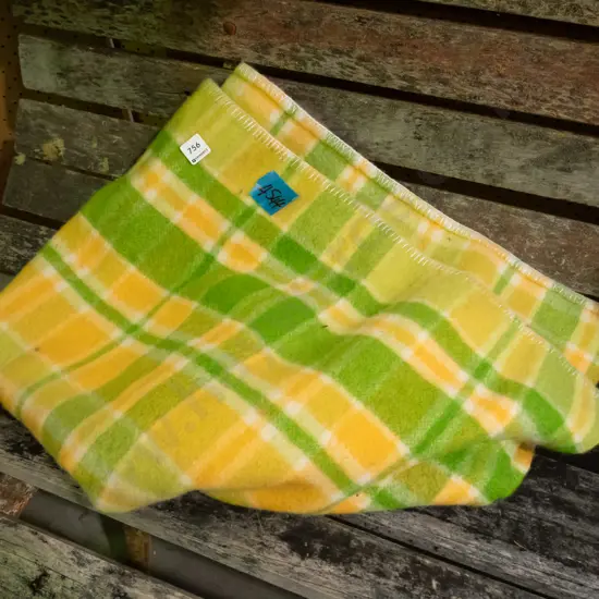 green and orange checked woollen blanket