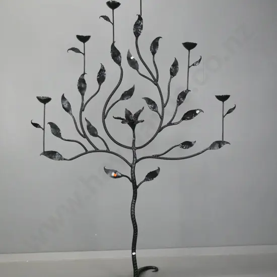 large wrought metal 6-candle floral and leaf motif with cup shaped candle holders, swirling 4-point base H-1630 W-1080