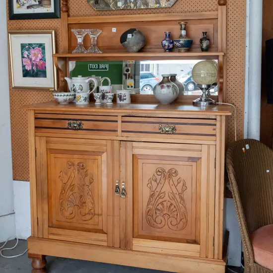 Edwardian colonial rimu mirror-back sideboard with plate stand and bevelled edge mirror, 2 drawers and 2 doors,