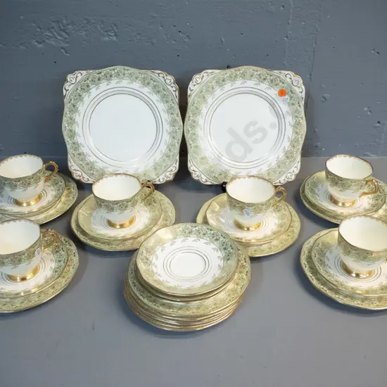 Etruscan "Plant" pattern tea ware - 6 trios, 2 cake plates, 3 spare saucers, 6 spare plates - some rubbing to gilt, some