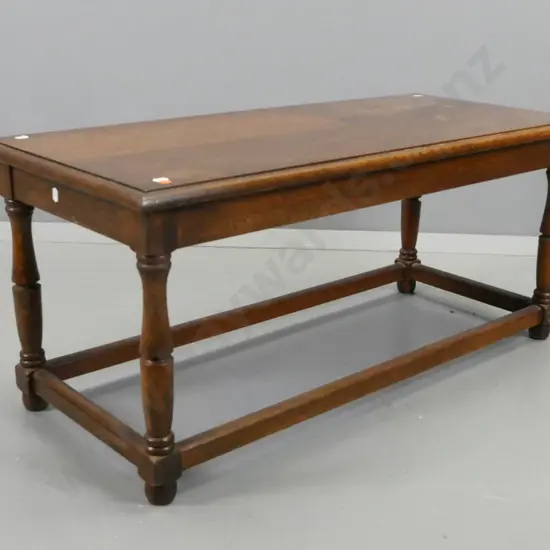 oak coffee table on turned legs & square section stretcher base - wear to top surface H-410 L-920 W-410