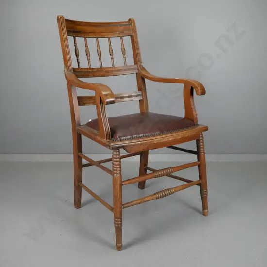 vintage spindle-back open-arm chair on turned legs and turned stretcher base, studded leather upholstered seat - one arm