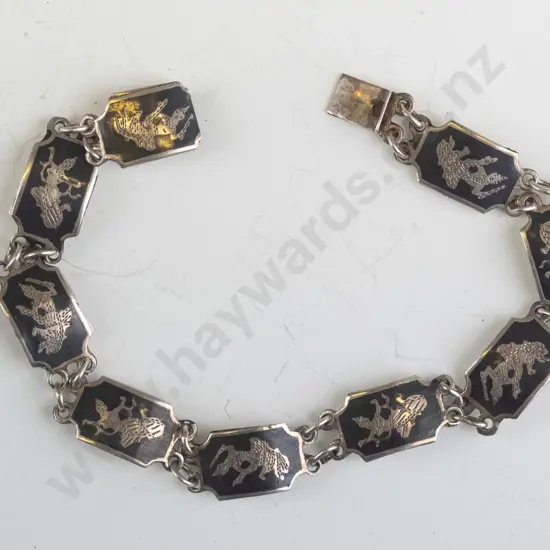 silver bracelet stamped Siam sterling