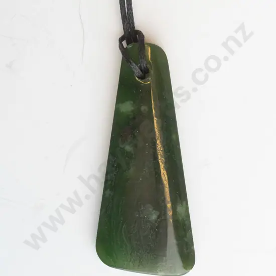greenstone pendant on leather