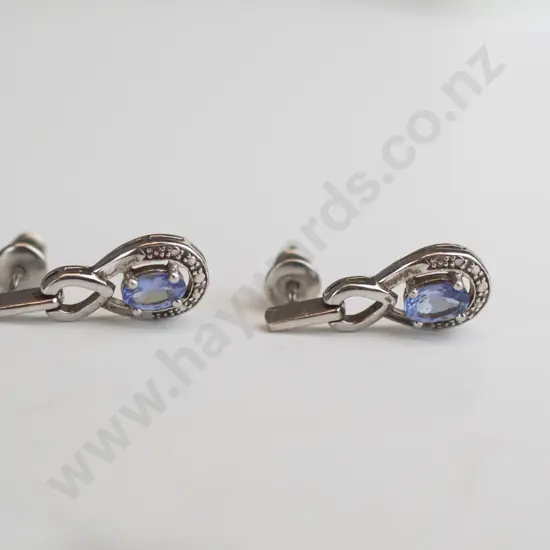 pair of silver blue stone earrings stamped 925