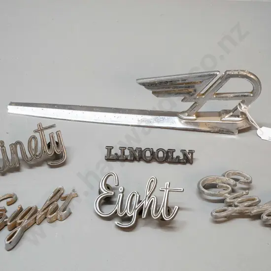 6 chrome car badges - Austin flying A bonnet ornament L-260 , one "Lincoln" three "Eight" and a "Ninety"