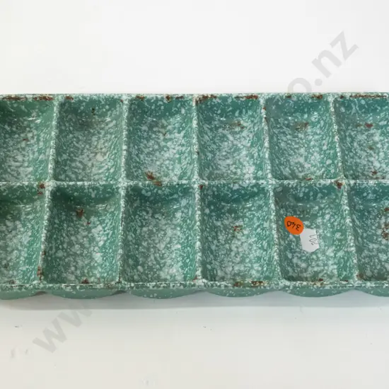 cast iron green speckled enamel gem iron - marked Champion. Some chips to enamel L-290 W-155