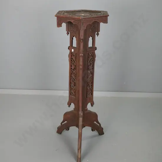 vintage profusely carved and pierced asian hardwood plant stand with elephant head legs, Persian arches, foliate designs
