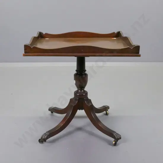 mahogany tray-top side table on pedestal base with 4 sweeping legs, brass paw feet & casters H-510 L-490 W-440