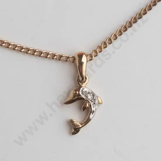 small dolphin necklace stamped 9k