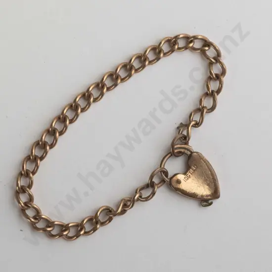 gold babys bracelet with heart clasp stamped 10ct lined