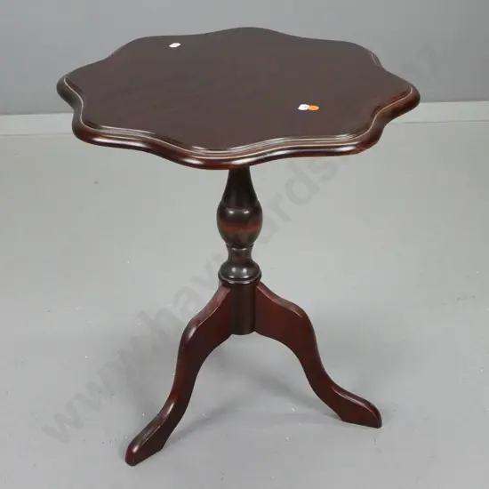 reproduction mahogany low pedestal wine table with 3 sweeping legs and scalloped edge top - some wear and scratches to