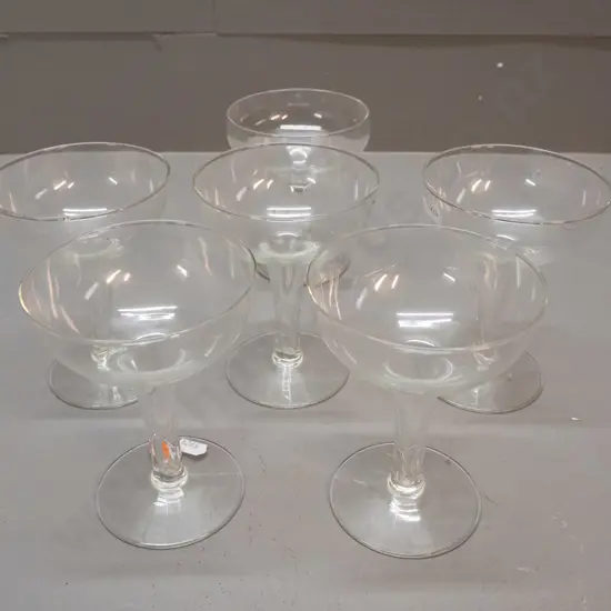 5 hollow-stemmed glass champagne glasses H-120 D-90 and one solid-stemmed in similar size