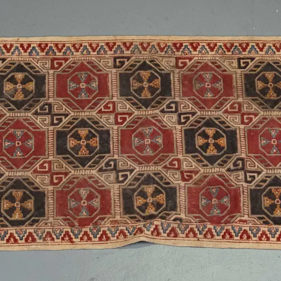 vintage small jute floor mat with printed Persian style geometric pattern - some spotting staining L-930 W-600
