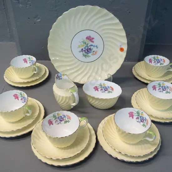 Aynsley yellow and white floral pattern 21-piece tea set - some rubbing to gilt, small chip to cream jug rim near handle