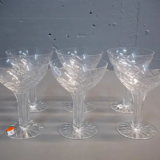 6 hollow-stemmed cut crystal champagne floats - 2 have small chips to rim. H-125 D-100