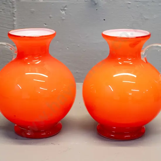 pair of orange glass white-lined handled vases w/ clear handles and bases H-160