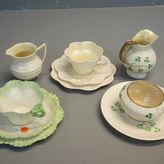 Belleek - black mark - 2 trios, 2 jugs and a sugar bowl - and a green mark spare saucer