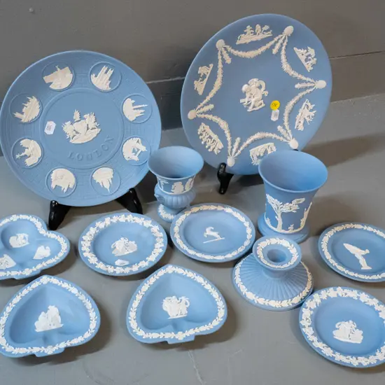 assorted Wedgwood light blue jasperware including 2 cabinet plates, pin dishes, candle holder, 2 vases etc. Larger